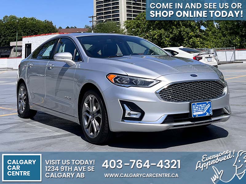 Used Sedan 2019 Ford Fusion Hybrid Silver for sale in Calgary