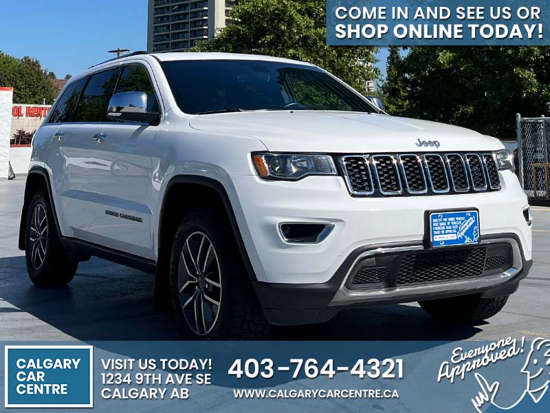 Used SUV 2019 Jeep Grand Cherokee White for sale in Calgary